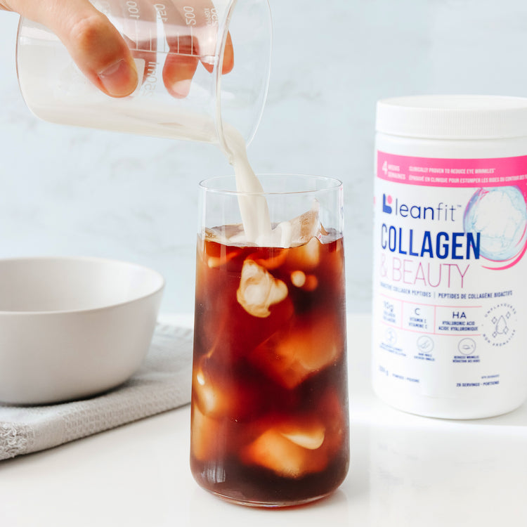 LEANFIT Collagen & Beauty mixed into iced coffee — unflavoured powder dissolves easily in hot or cold drinks