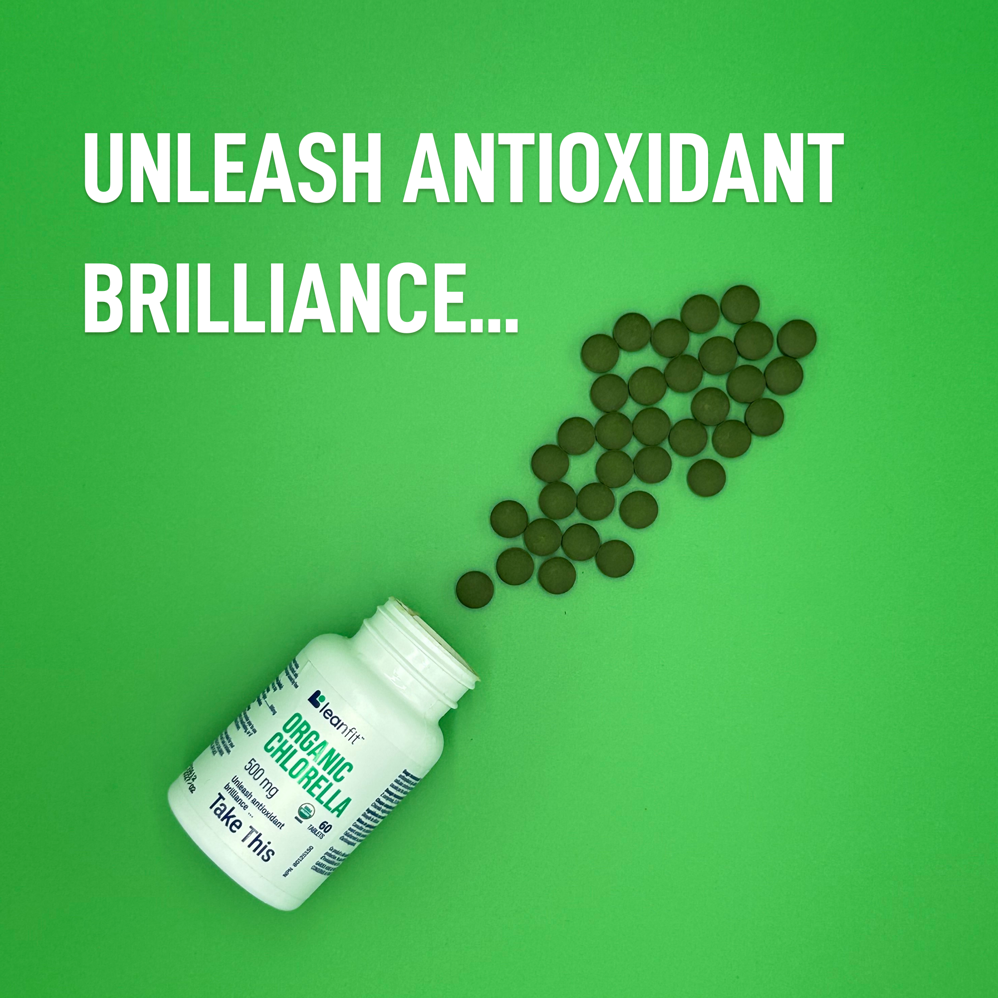 Unleash antioxidant brilliance — Organic Chlorella tablets and bottle on green background
